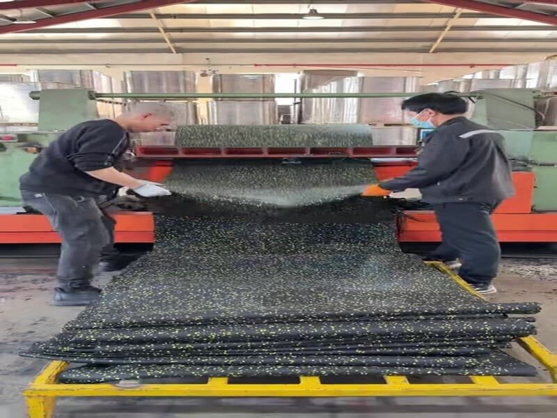 mop cleaning a rubber floor